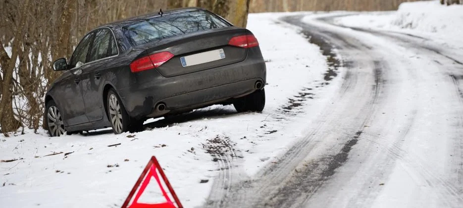 How does less daylight increase winter road risks?